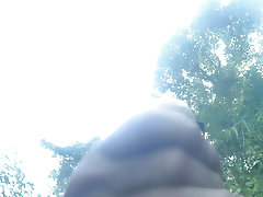 I n a public park river playing with my cock