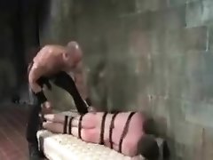 BDSM bondage gay boy is whipped fucked and milked scene 2