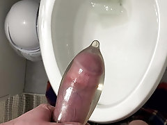 Tom Rivers Empties His Bladder and Fills a Condom