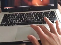 Young guy jerking off watching a porn